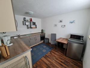 Kuchyň nebo kuchyňský kout v ubytování Ferienwohnung im alten Milchwerk