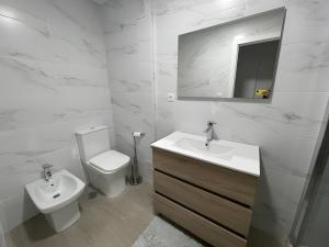 Ένα μπάνιο στο Apartamento Plaza Tallista