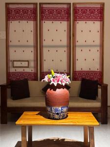 Coin salon dans l'établissement Atithya Vesta Homestay