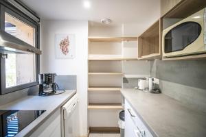 Kuchyň nebo kuchyňský kout v ubytování Maison 6-8 pers – Golfe du Valinco