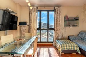 TV a/nebo společenská místnost v ubytování Apartamento diseño a pie de pista