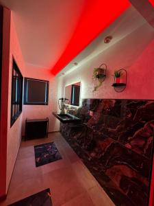 Χώρος καθιστικού στο Suite Camélia Luxury & Love