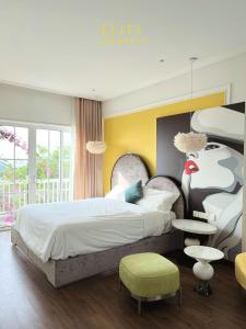 Ένα ή περισσότερα κρεβάτια σε δωμάτιο στο Villa Phan thiết Novaworld