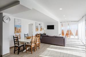 TV a/nebo společenská místnost v ubytování Ático deluxe Corralejo centro