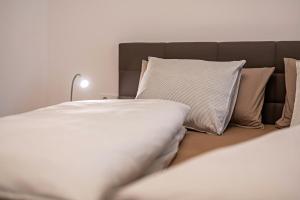 Postel nebo postele na pokoji v ubytování Plose 35