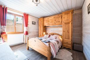 Postel nebo postele na pokoji v ubytování Gîte Val-cenis la Gelinotte Cosy