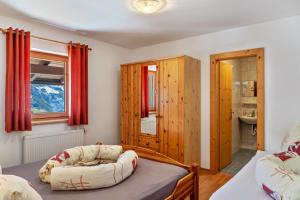 Postel nebo postele na pokoji v ubytování Fewo Innerspielleiten 24 Personen