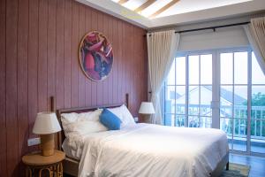 Ένα ή περισσότερα κρεβάτια σε δωμάτιο στο Villa Phan thiết Novaworld