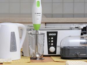 Příslušenství pro přípravu čaje a kávy v ubytování Ferienhaus Sunny