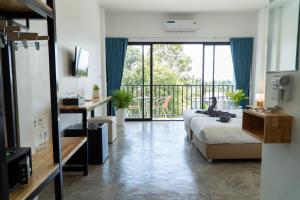 TV a/nebo společenská místnost v ubytování Buddha View Hostel