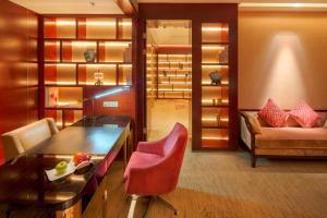 Khu vực ghế ngồi tại Sanding New Century Grand Hotel Yiwu