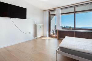 TV a/nebo společenská místnost v ubytování Fewo S22