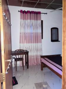 Ένα ή περισσότερα κρεβάτια σε δωμάτιο στο Punkalasa Natural Park