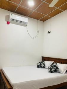 Ένα ή περισσότερα κρεβάτια σε δωμάτιο στο Punkalasa Natural Park