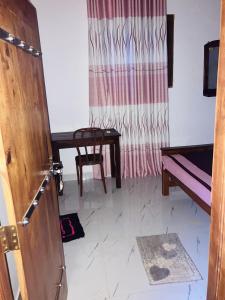 Ένα ή περισσότερα κρεβάτια σε δωμάτιο στο Punkalasa Natural Park +1 φωτογραφίες