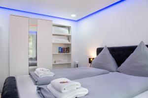 Katil atau katil-katil dalam bilik di Modern Apartments Neuburg 3 - New