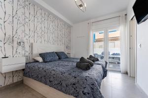 En eller flere senge i et værelse på Apartamento Miguel Marquez Casajari