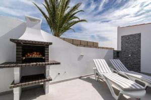 Galeriebild der Unterkunft Bungalow con piscina comunitaria in Chayofa