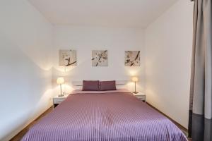 Postel nebo postele na pokoji v ubytování Ferienwohnung Panorama Eg