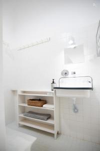 Kuchyň nebo kuchyňský kout v ubytování A casa da lua cheia