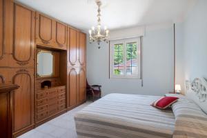 Katil atau katil-katil dalam bilik di La Ca' Di Marì