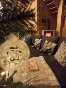 Χώρος καθιστικού στο Domek Luna Wilcza Zagroda