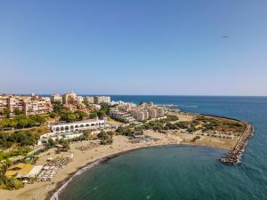 an aerial view of a beach and the ocean at Casa Eva in Estepona