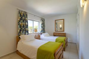 Ένα ή περισσότερα κρεβάτια σε δωμάτιο στο Vila Senna +9 φωτογραφίες