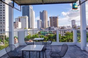 Μπαλκόνι ή βεράντα στο Coastal Nest - Steps to Sand