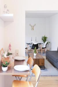 a living room with a table and chairs at Apartment-Peter in Finsterwalde