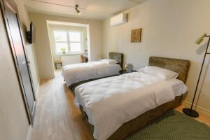 Katil atau katil-katil dalam bilik di Pievos