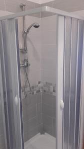 a shower with a glass door in a bathroom at da Ciccio e Concy in Tursi +48 photos