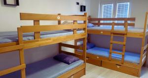 Postel nebo postele na pokoji v ubytování Lierra Downtown Hostel