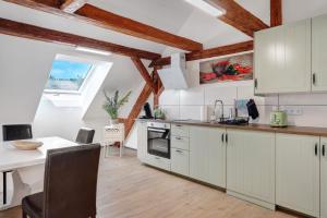 Kuchyň nebo kuchyňský kout v ubytování Ferienwohnung Julia