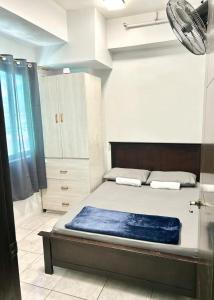 Ένα ή περισσότερα κρεβάτια σε δωμάτιο στο Stay At Omari