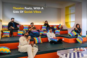 a group of people sitting on a couch at goSTOPS Mcleodganj, Bhagsu in McLeod Ganj