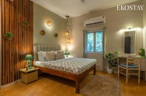 Кровать или кровати в номере EKOSTAY - Copacabana Villa +22 фотографии