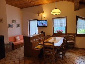 TV a/nebo společenská místnost v ubytování Casa Pozzobon