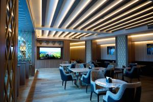 Televisyen dan/atau pusat hiburan di Venice Hotel Complex