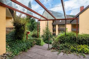 a building with a glass roof and a fire hydrant at Ferienwohnung Weitblick in Bad Liebenzell