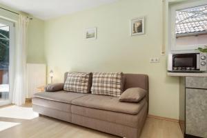 TV a/nebo společenská místnost v ubytování Haus Jacqueline