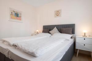 Postel nebo postele na pokoji v ubytování Haus Jacqueline