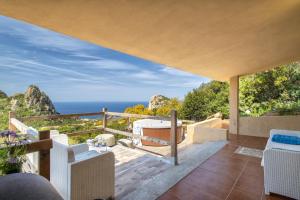 a villa with a view of the ocean at Villa Aloe in Costa Paradiso