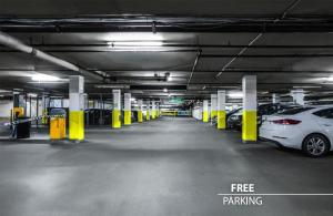 a parking garage with cars parked in it at Metropolitan Old Town Hotel - Czech Leading Hotels in Prague +25 photos