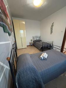 Un ou plusieurs lits dans un hébergement de l'établissement Casa Domus Oppiorum