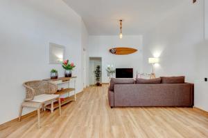 Телевизор и/или развлекательный центр в Apartamento Caleta Interian