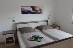 Postel nebo postele na pokoji v ubytování Ferienhaus Seaside