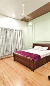 Postel nebo postele na pokoji v ubytování Blissora Retreat Villa by StayJade-Pvt Pool-Lawn