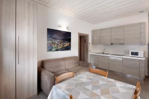 Kuchyň nebo kuchyňský kout v ubytování Appartamenti Arcobaleno Viola