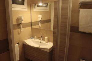 Koupelna v ubytování Hotel Donatella Pinarella